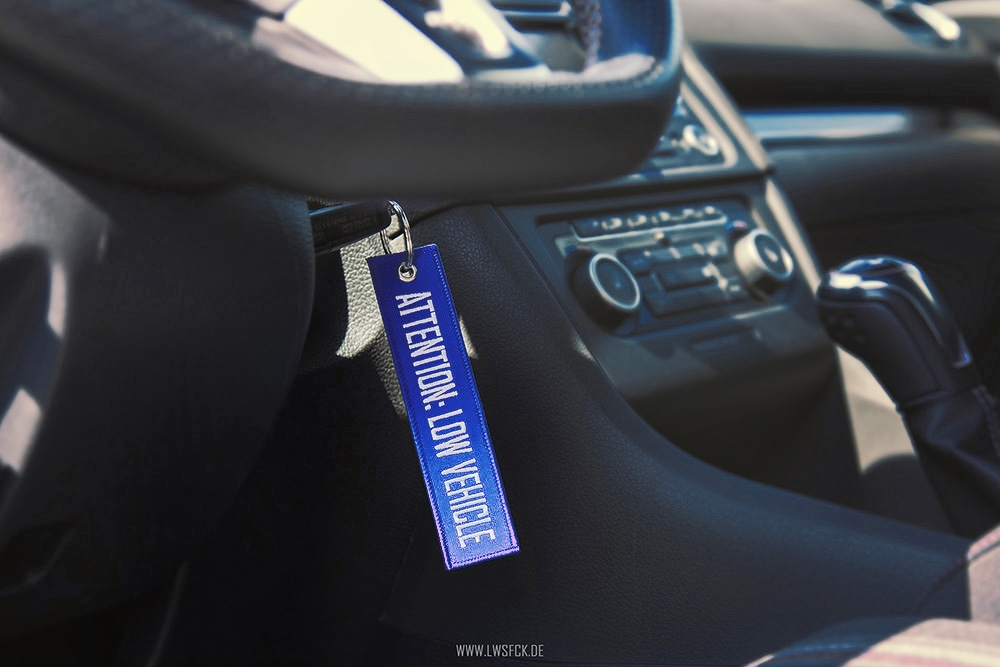 Attention Low Vehicle Keychain Blue