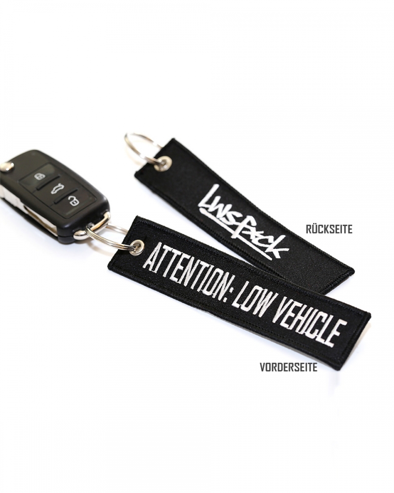 Attention Low Vehicle Keychain Black